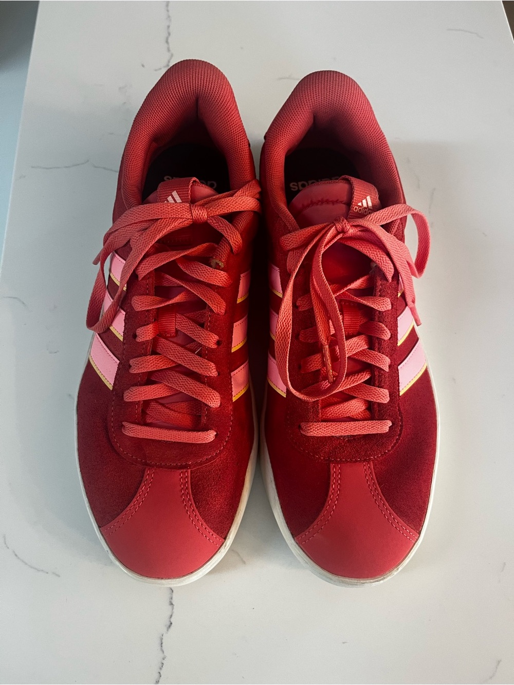 adidas Women’s Pink Sneakers with Pink / yellow Stripe Accents.Size 10